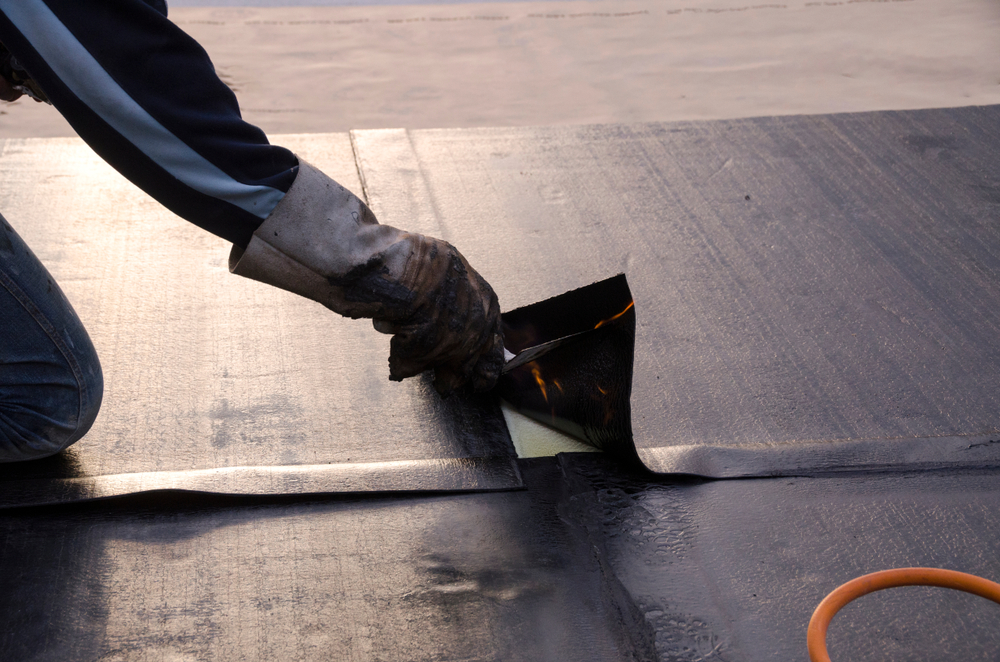 Laying,of,waterproofing,sheathing,and,insulation,during,the,renovation,of